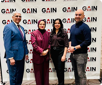 Tehmina at the GAIN conference standing with global founders and investors