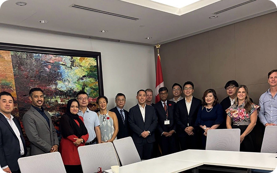 Tehmina with a delegation of founders in a boardroom